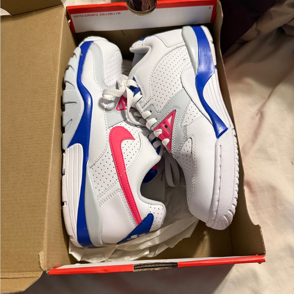 Nike White and Blue Athletic Shoes with Classic Design